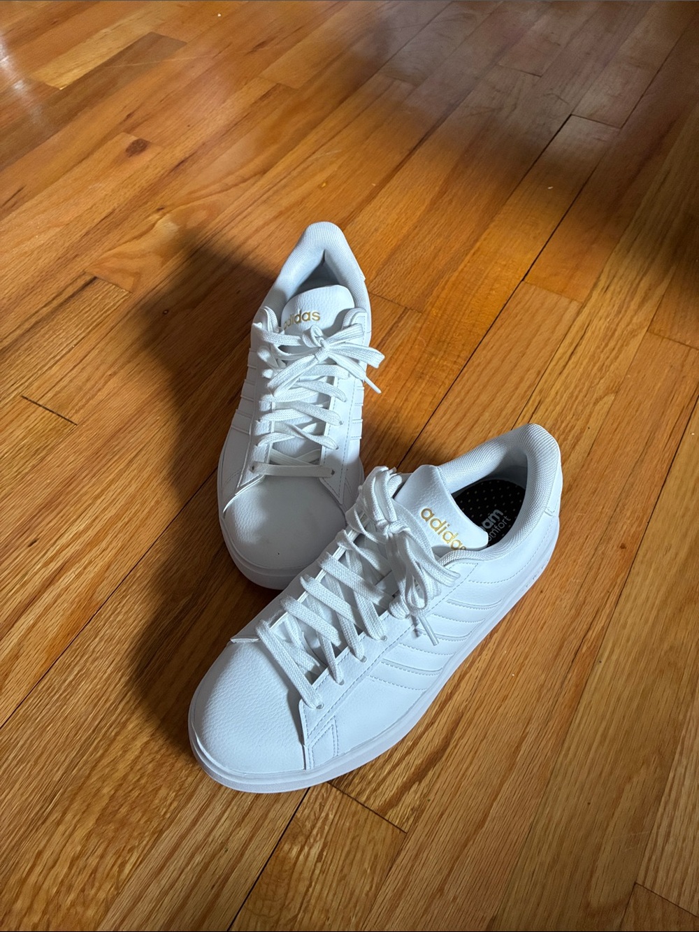 adidas Women’s White Sneakers with Gold Logo